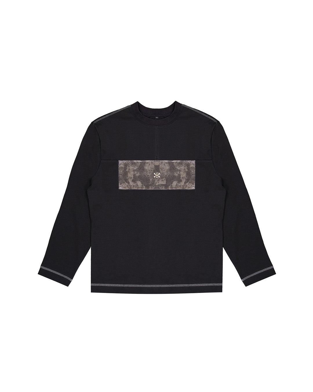 KIMMICK creviced patchwork long sleeve black top with unique textured design, fitted style, and crew neckline.