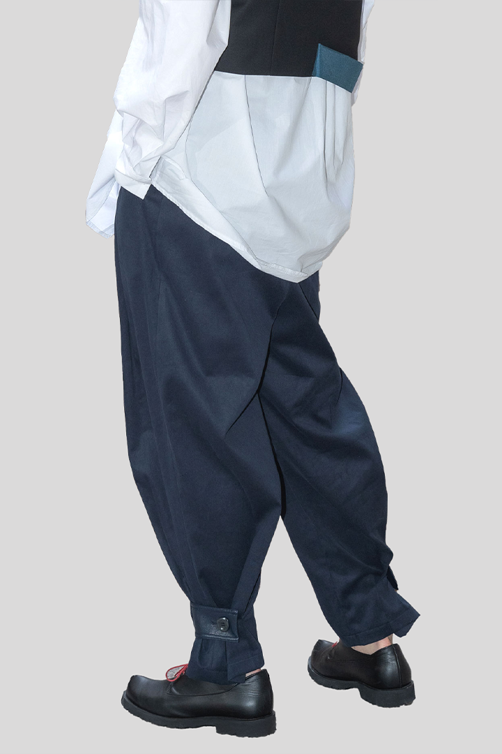 Navy Peach Balloon Double Wide Trousers by Ahhorn, featuring a relaxed fit and wide-leg design, styled on a model.