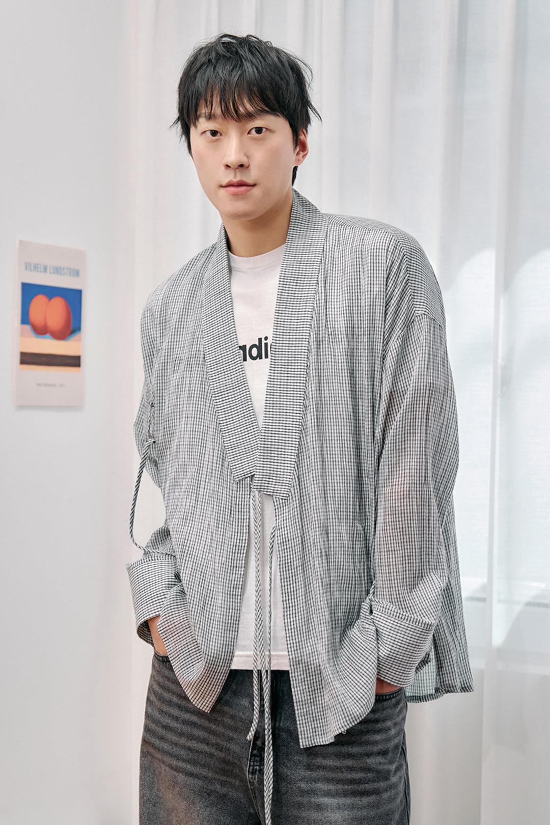 White lattice-pattern long Jeogori shirt for men by CCOMAQUE, featuring traditional design with long sleeves and a relaxed fit.