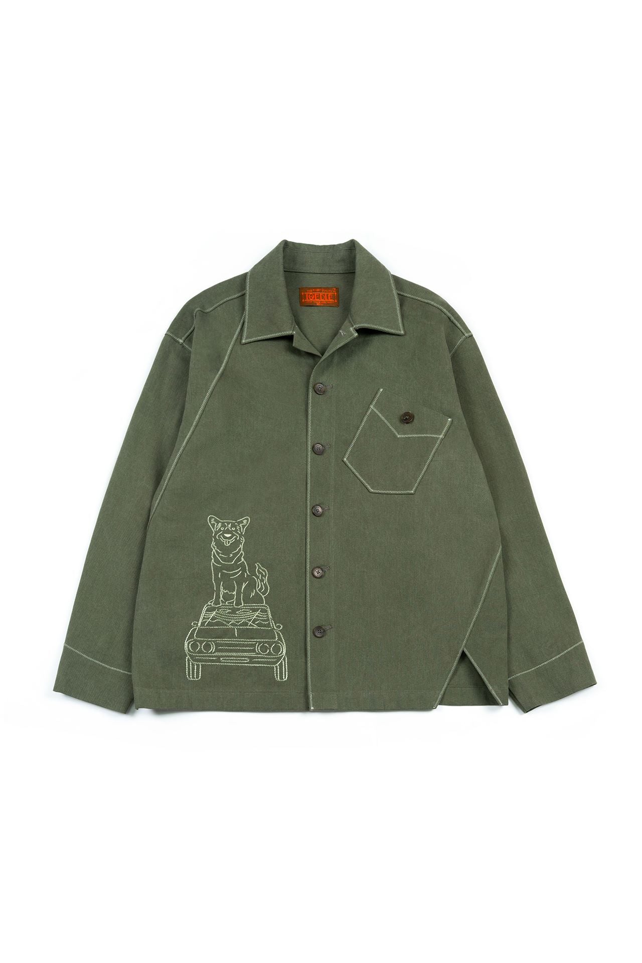 Green IOEDLE diagonal landscape shirt featuring a vibrant, geometric pattern on lightweight fabric.