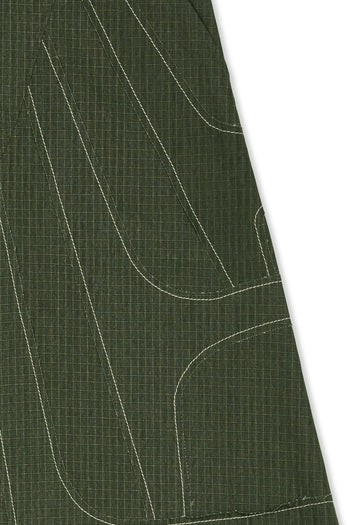 IOEDLE stitched stream skirt featuring intricate stitching details and flowing fabric, perfect for stylish, elegant outfits.