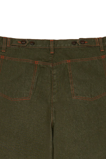 Laser-engraved pants from IOEDLE featuring a unique strange landing pattern, shown in a close-up view.