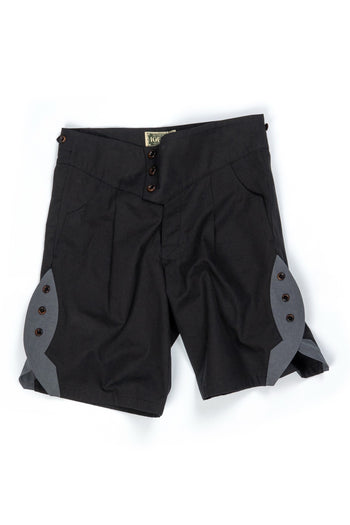 IOEDLE rocket-slit shorts showing fitted black shorts with a distinctive rocket slit design on the side.