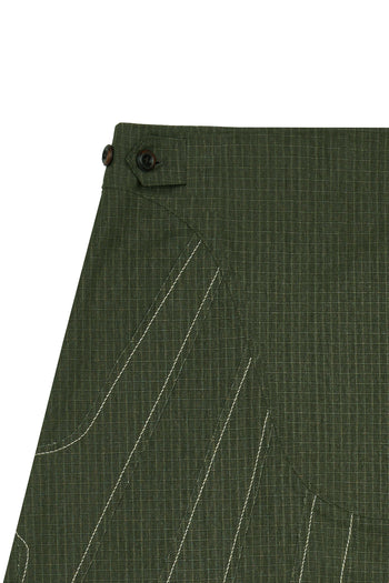 IOEDLE stitched stream skirt with detailed stitching and flowing fabric, showcased on a model in a stylish, elegant setting.