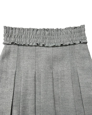 LOVE CRAZY WILD MAN melange grey frill pleats skirt with layered design and flowy fabric, shown on a model.