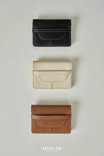 Black MIULIN 1st Anniversary Edition wallet bag with sleek design and compact size, perfect for everyday use.