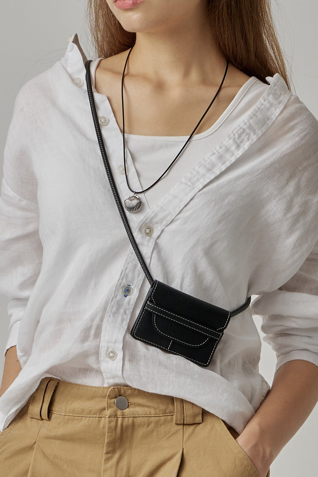 Black MIULIN 1st Anniversary Edition Wallet Bag with sleek design and compact size, perfect for stylish everyday use.