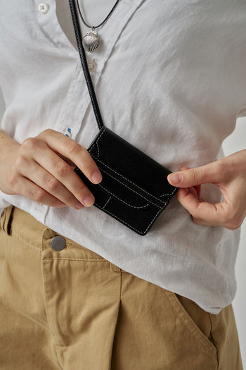 Black MIULIN 1st Anniversary Edition Wallet Bag with sleek design, compact size, and minimalistic style for everyday use.