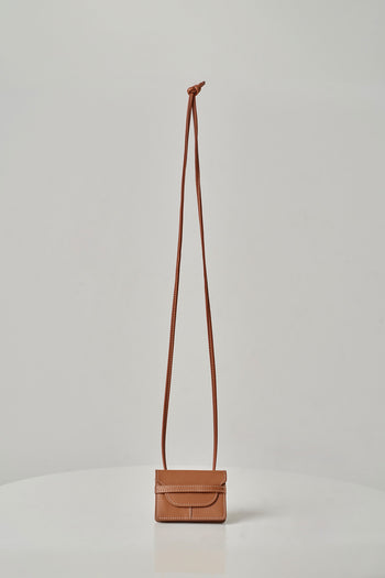 MIULIN 1st Anniversary Edition Wallet Bag in camel leather with sleek design and compact size for everyday use.