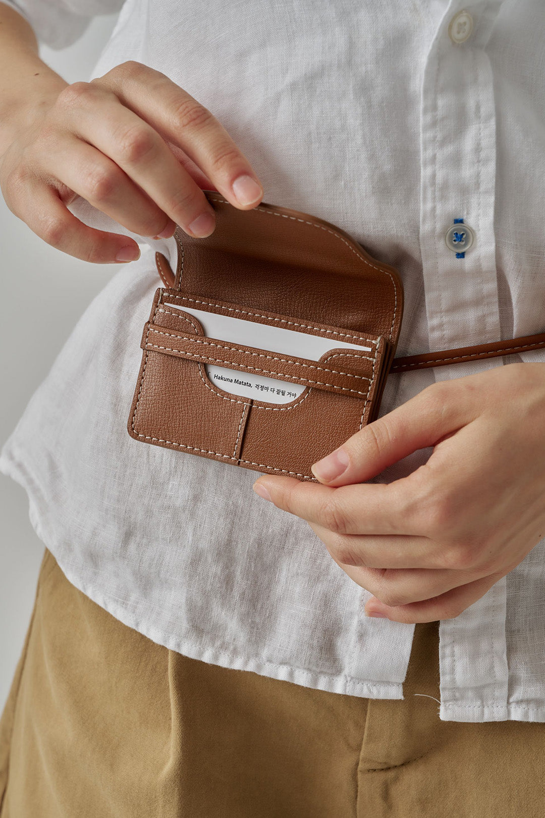 MIULIN 1st Anniversary Edition wallet bag in camel leather, compact and stylish with a sleek design and gold-tone hardware.