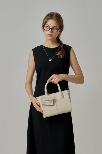 Ivory MIULIN 1st Anniversary Edition wallet bag with sleek design and compact shape, perfect for everyday use.