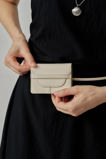 Ivory MIULIN 1st Anniversary Edition wallet bag with sleek design, compact size, and elegant details displayed in the image.