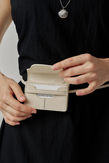 Ivory MIULIN 1st Anniversary Edition wallet bag with sleek design and compact size, perfect for stylish everyday use.