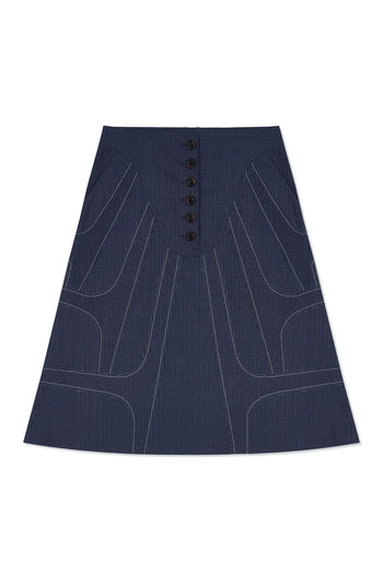 IOEDLE stitched stream skirt in soft fabric with stitched detailing, showcased on a model. Perfect for casual or dressy occasions.