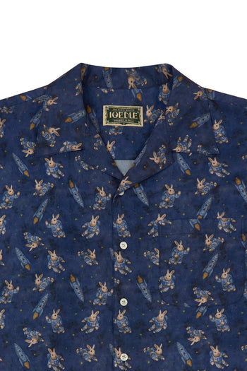 Porcelain Flight short-sleeve shirt by IOEDLE, featuring a detailed porcelain-inspired flight design on a lightweight shirt.
