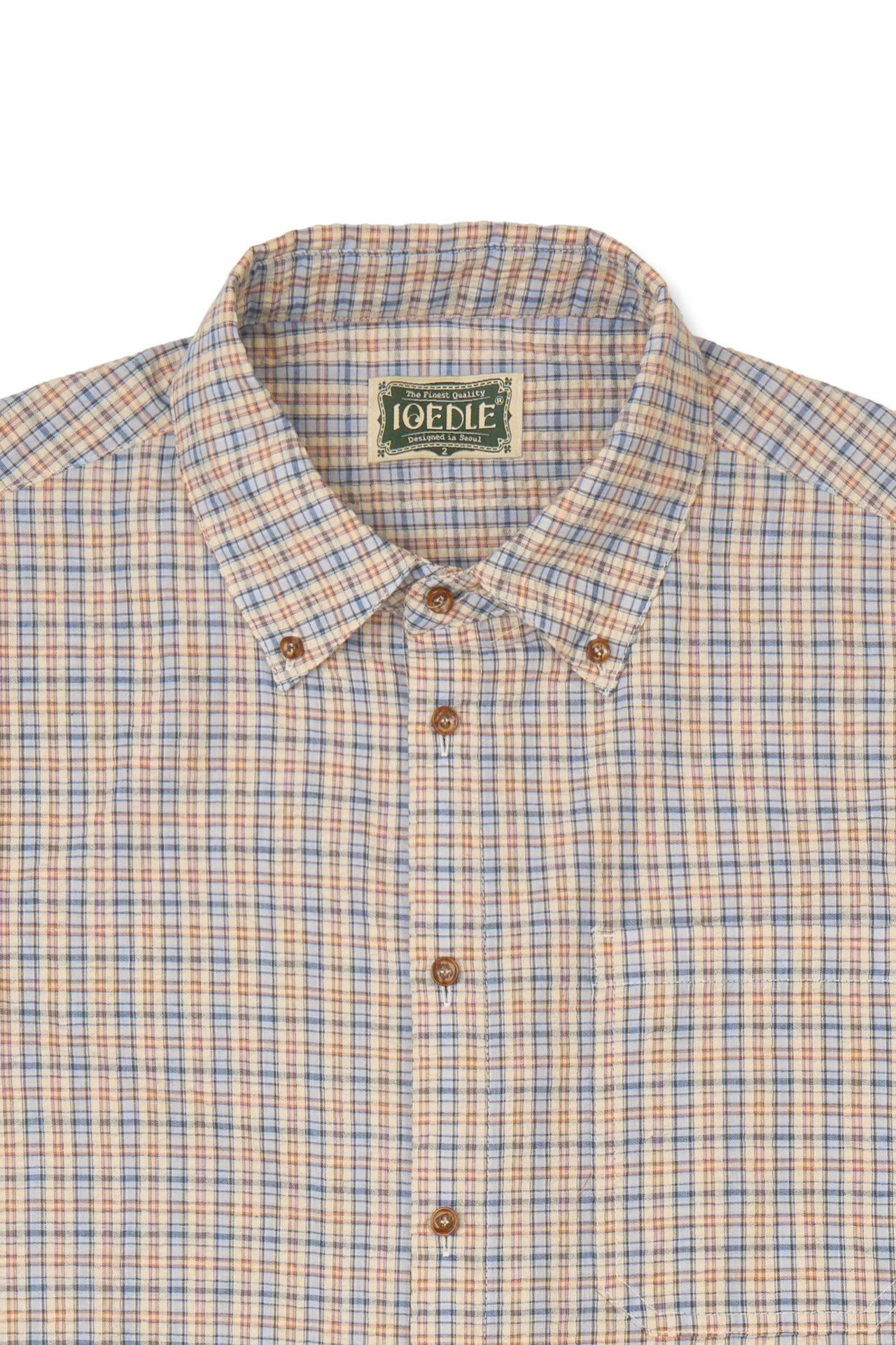 IOEDLE Rocket Slit Short-sleeve Shirt with modern design and slit details, shown in a stylish, casual fit.