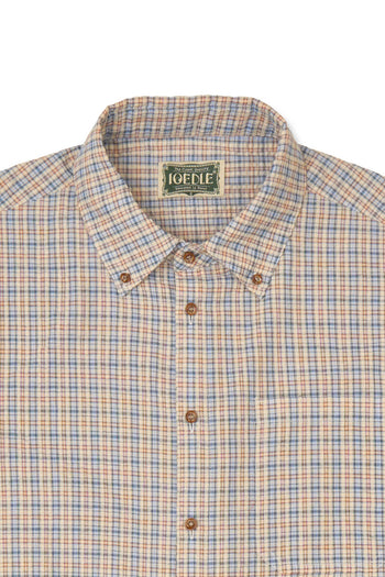 IOEDLE Rocket Slit Short-sleeve Shirt with modern design and slit details, shown in a stylish, casual fit.