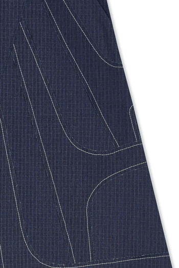 IOEDLE stitched stream skirt featuring a sleek, flowing design with stitched detailing, perfect for stylish everyday wear.