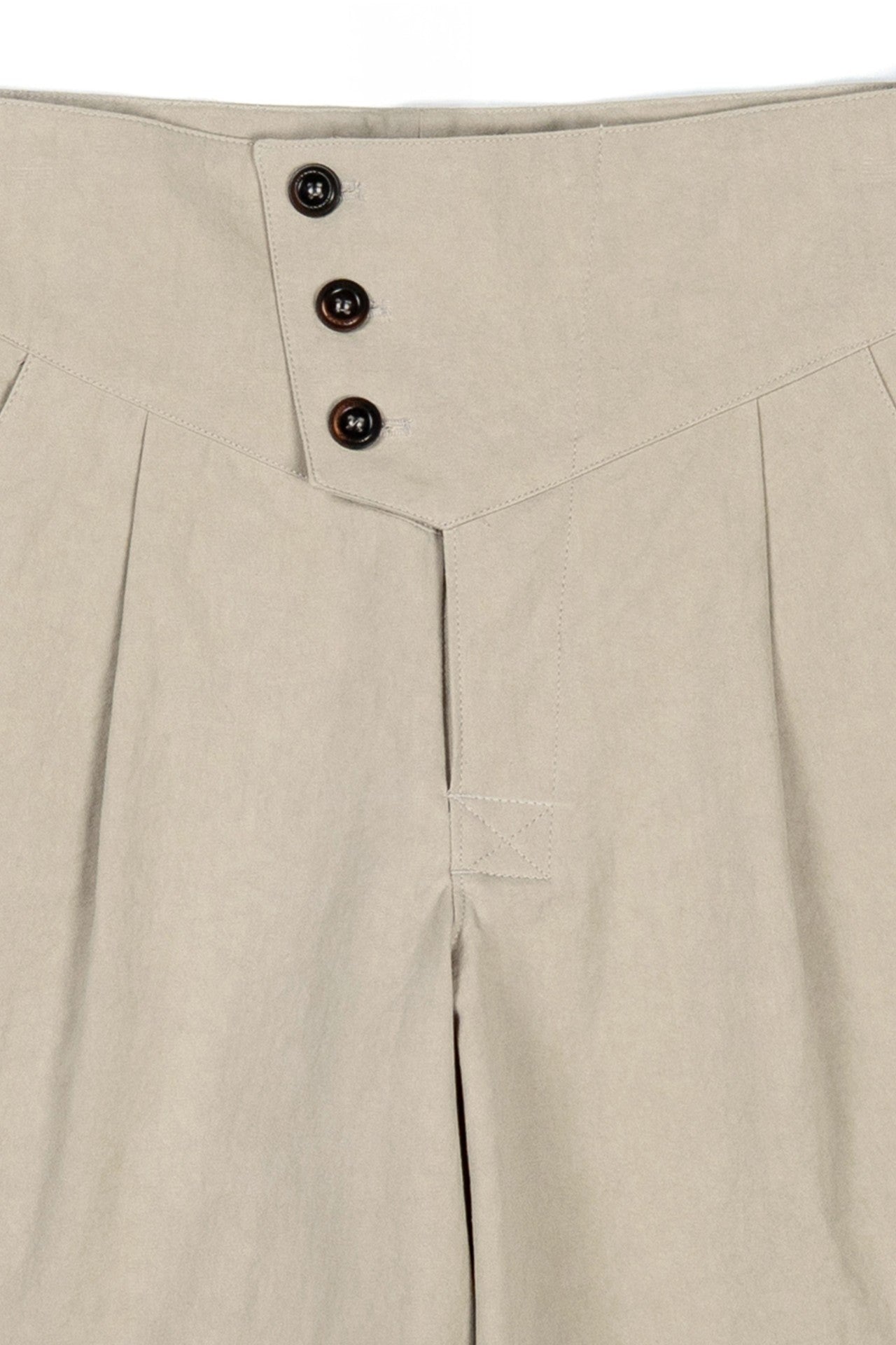 IOEDLE Rocket-Slit Shorts, stylish casual shorts with distinctive side slit design, shown on a model in a relaxed urban setting.