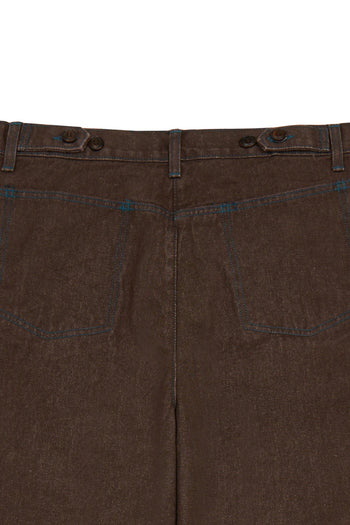 Laser-engraved pants by IOEDLE featuring intricate strange landing design, shown in a stylish front view.