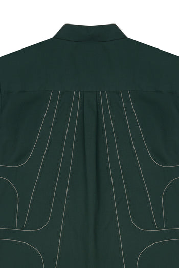 IOEDLE stitched stream short-sleeve shirt displayed with detailed stitching and relaxed fit on a mannequin.