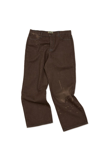 Laser-engraved pants from IOEDLE featuring unique strange landing design, shown in a close-up view highlighting the detailed pattern.