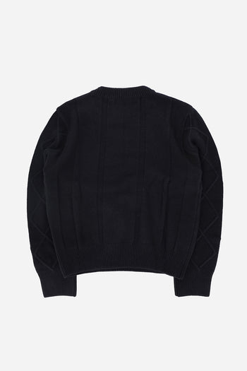 Black LOVE CRAZY WILD MAN sweater featuring a cozy knit texture and a relaxed fit, perfect for casual wear.