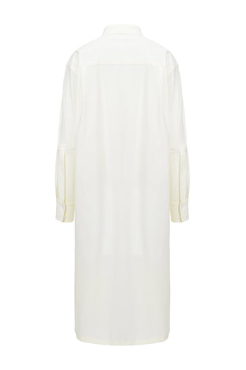 Ivory long shirt jumper by LOVE CRAZY WILD MAN, featuring a relaxed fit and button-front design, displayed on a hanger.