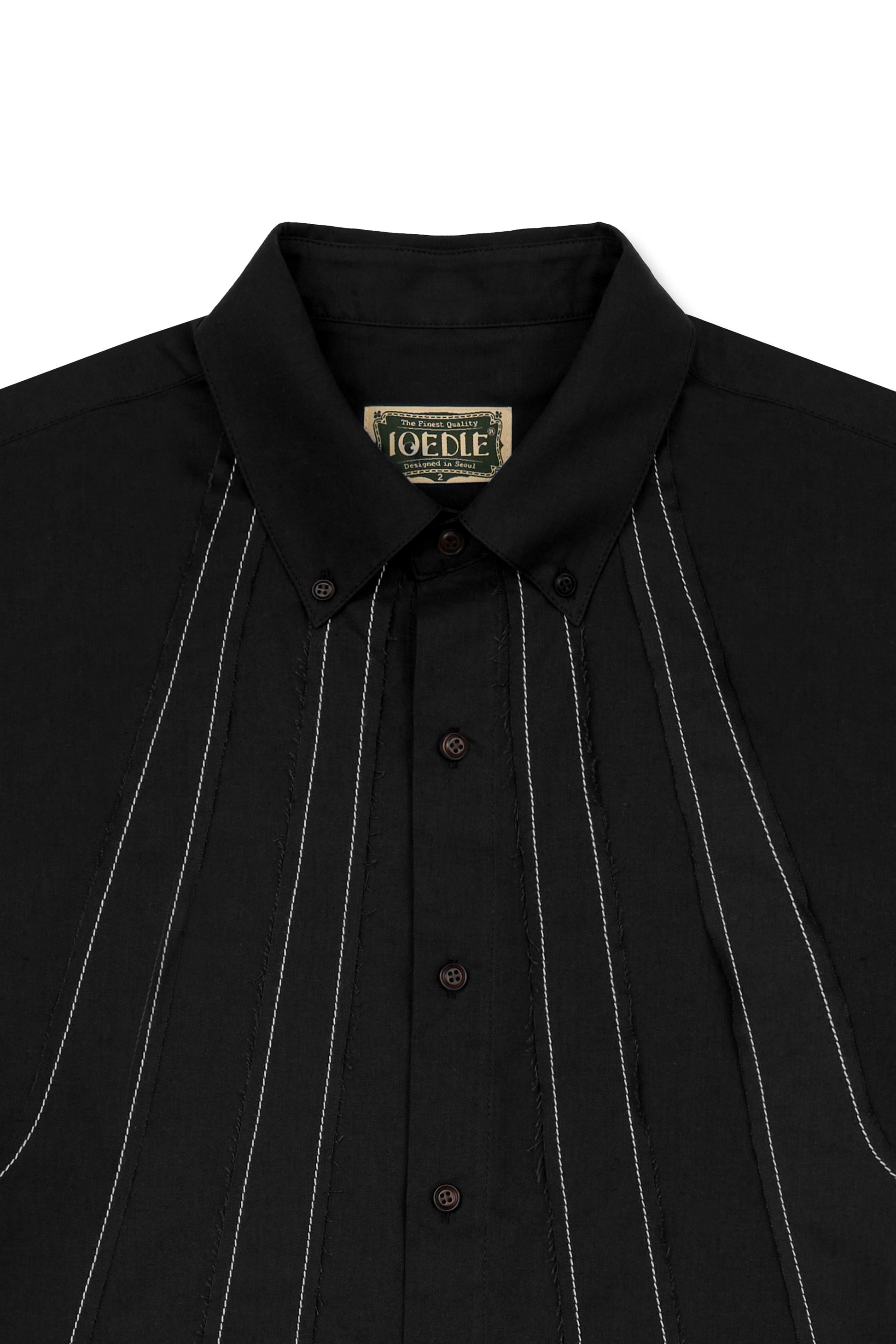 IOEDLE stitched stream short-sleeve shirt displayed on a hanger, featuring a casual design with stitched details and a comfortable fit.