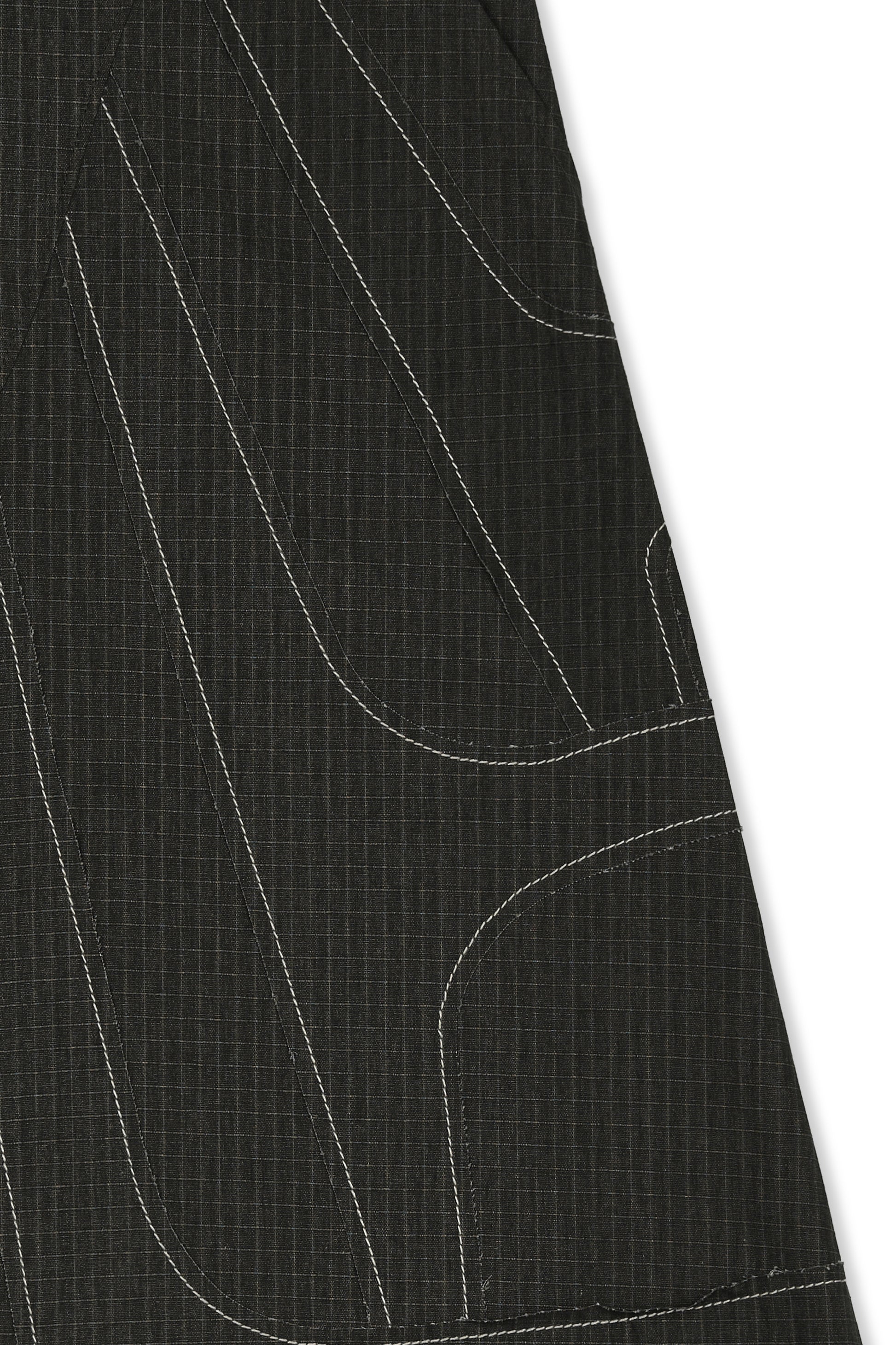 IOEDLE stitched stream skirt featuring elegant stitching details and a flowing design, showcased from a side view.
