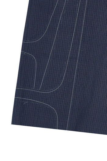 IOEDLE stitched stream shorts in black fabric, featuring a relaxed fit and stitched detailing, perfect for casual wear.