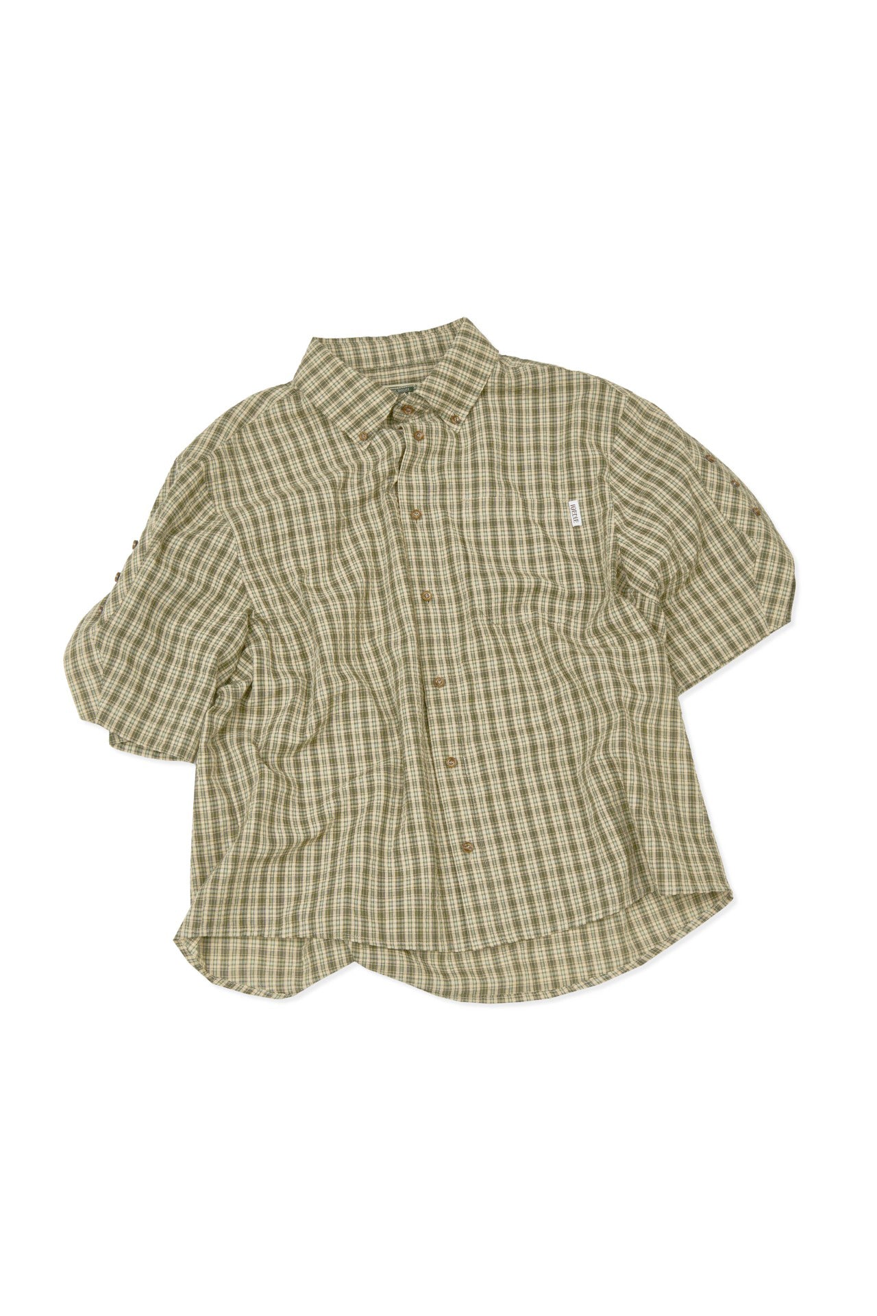 IOEDLE Rocket Slit Short-sleeve Shirt featuring a modern design with a front slit, lightweight fabric, and casual fit.
