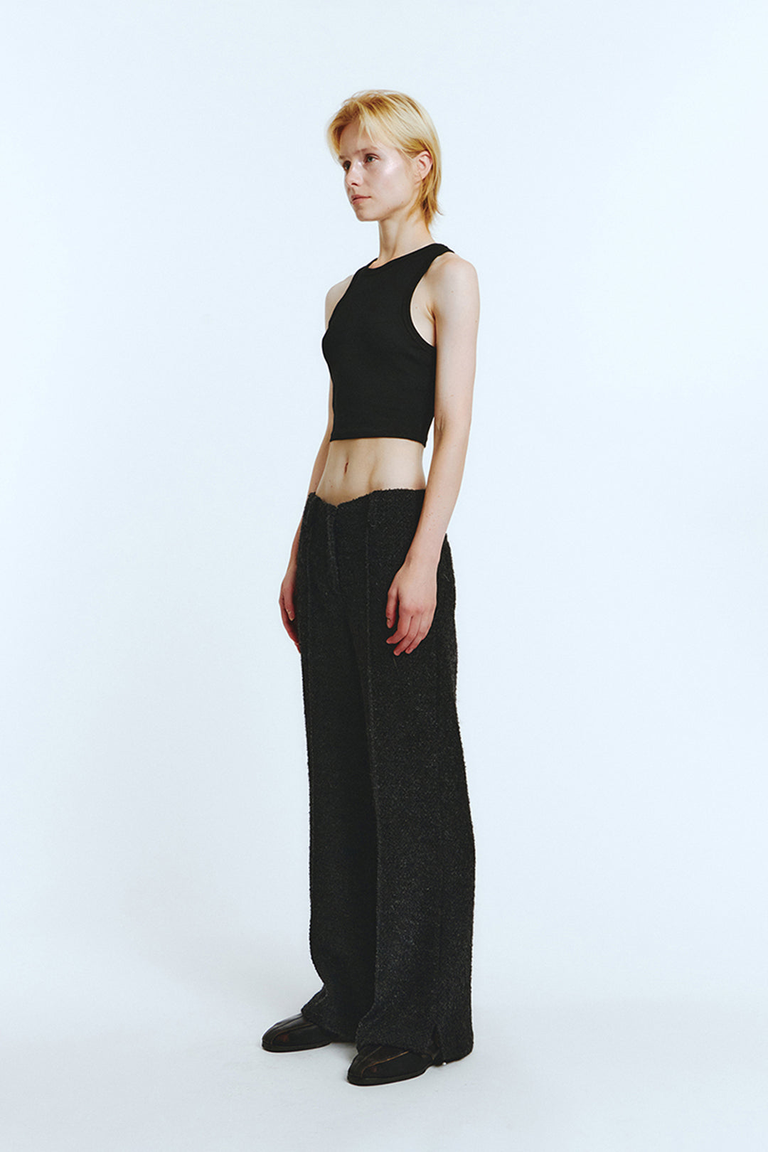 Black Bouncle Bell Bottoms by LOVE CRAZY WILD MAN featuring a high-waisted fit and flared leg design.