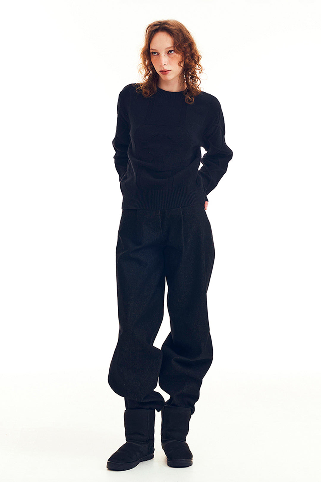 Black LOVE CRAZY WILD MAN sweater with a cozy knit texture and a stylish fit, perfect for casual wear.