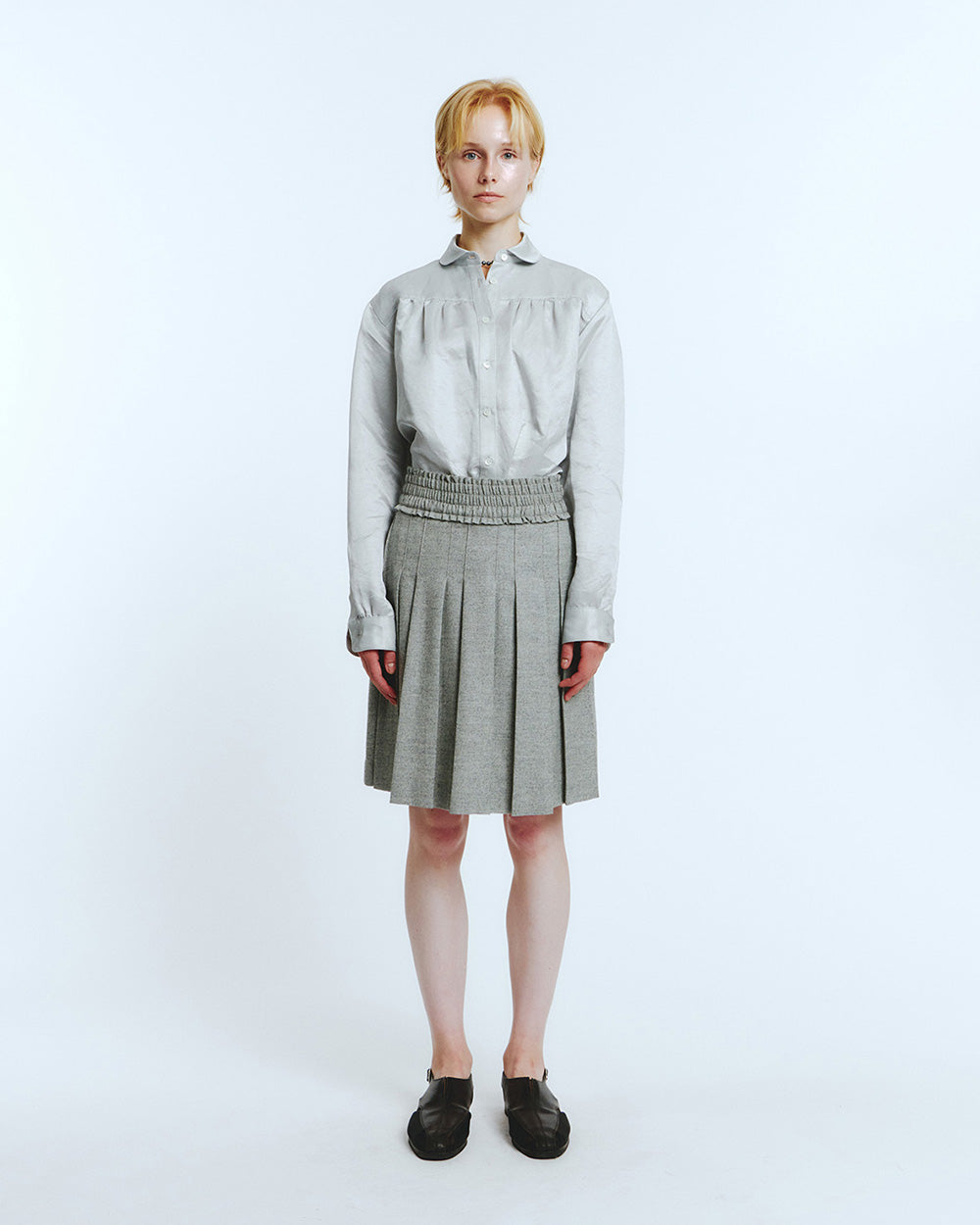 LOVE CRAZY WILD MAN frill pleats skirt in melange grey fabric, showcasing flowing pleated design and stylish urban fashion details.
