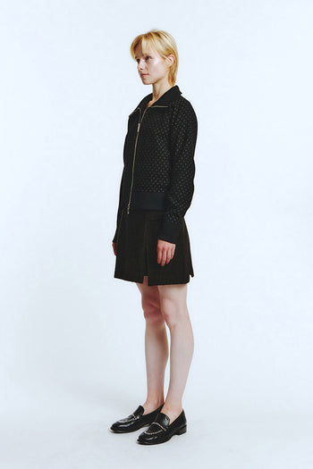 Black wool track jumper by LOVE CRAZY WILD MAN, showing a cozy, fitted jumper with ribbed cuffs and collar.