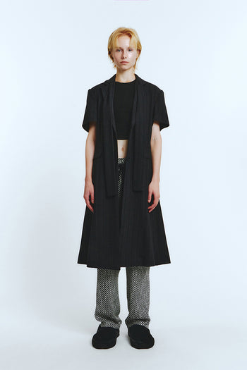 Black half-sleeve coat by LOVE CRAZY WILD MAN, featuring a stylish, tailored design perfect for versatile fashion.