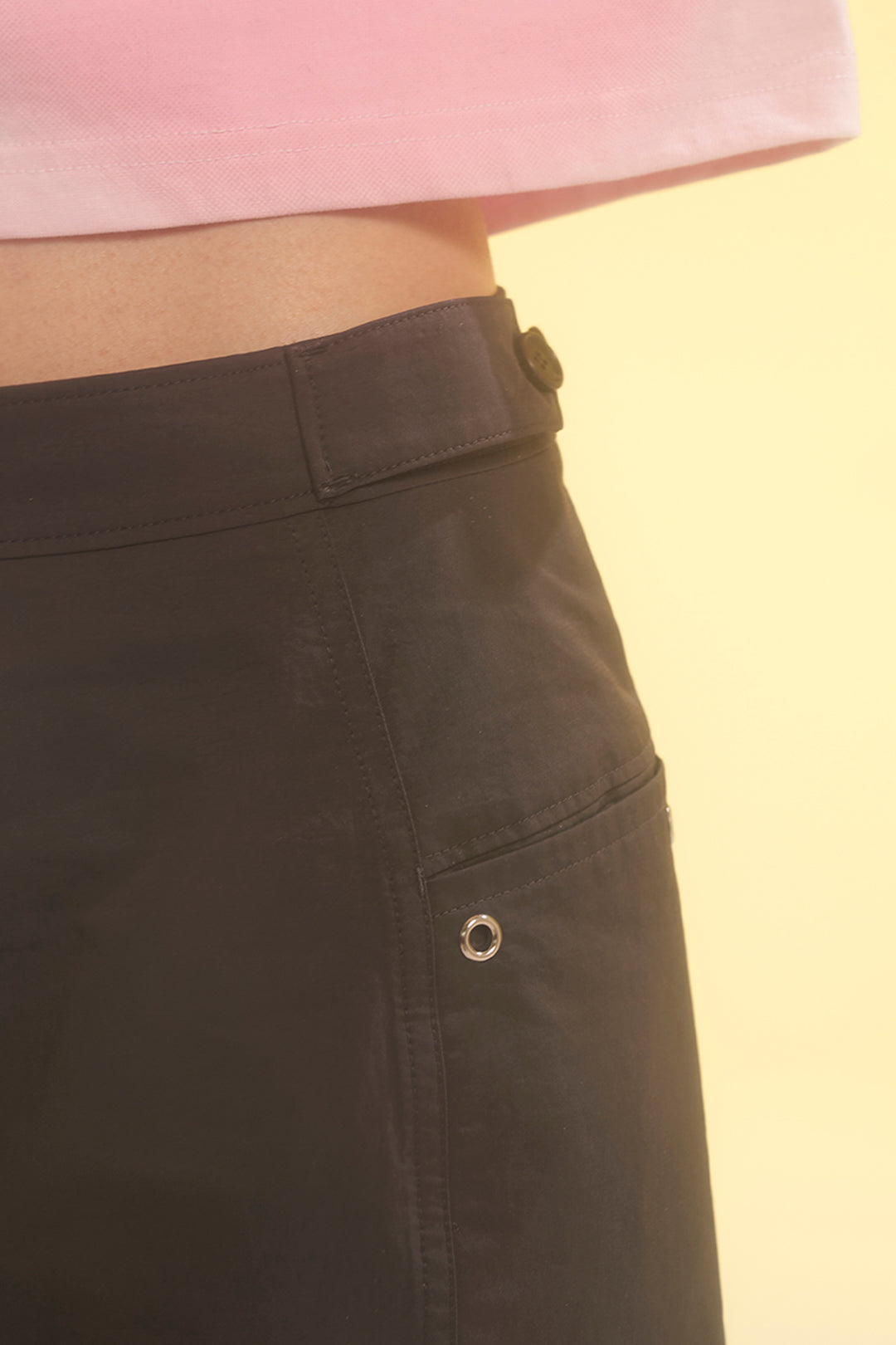 Charcoal tabs cargo pants from LOVE CRAZY WILD MAN featuring multiple pockets and a relaxed fit, shown on a model.
