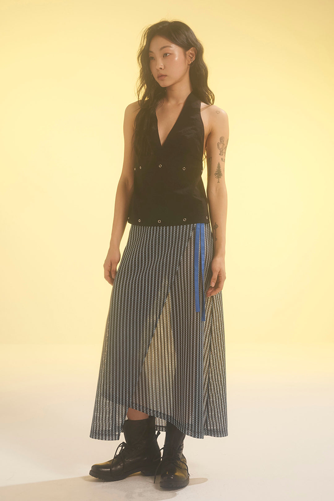 Blue striped mesh wrap skirt by LOVE CRAZY WILD MAN, featuring a lightweight, breathable design with a stylish wrap style.