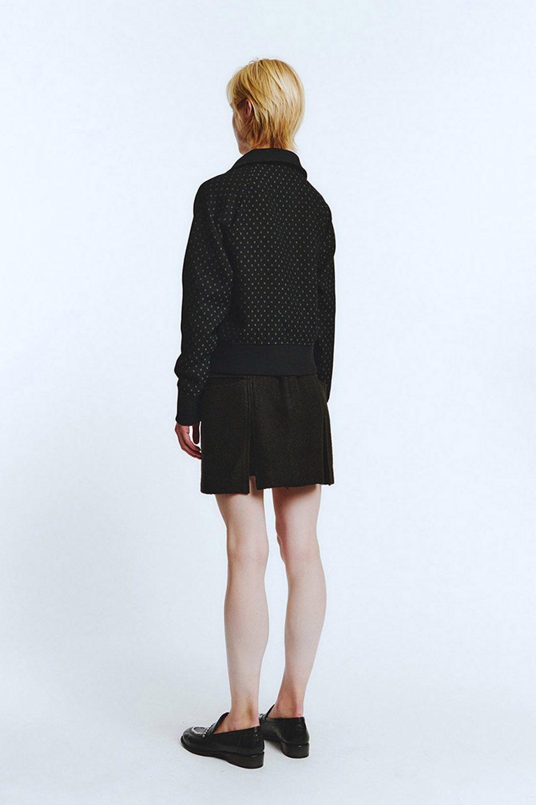 Black wool track jumper by LOVE CRAZY WILD MAN, featuring a cozy knit fabric and sporty fit, suitable for casual wear.