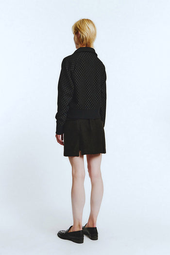 Black wool track jumper by LOVE CRAZY WILD MAN, featuring a cozy knit fabric and sporty fit, suitable for casual wear.