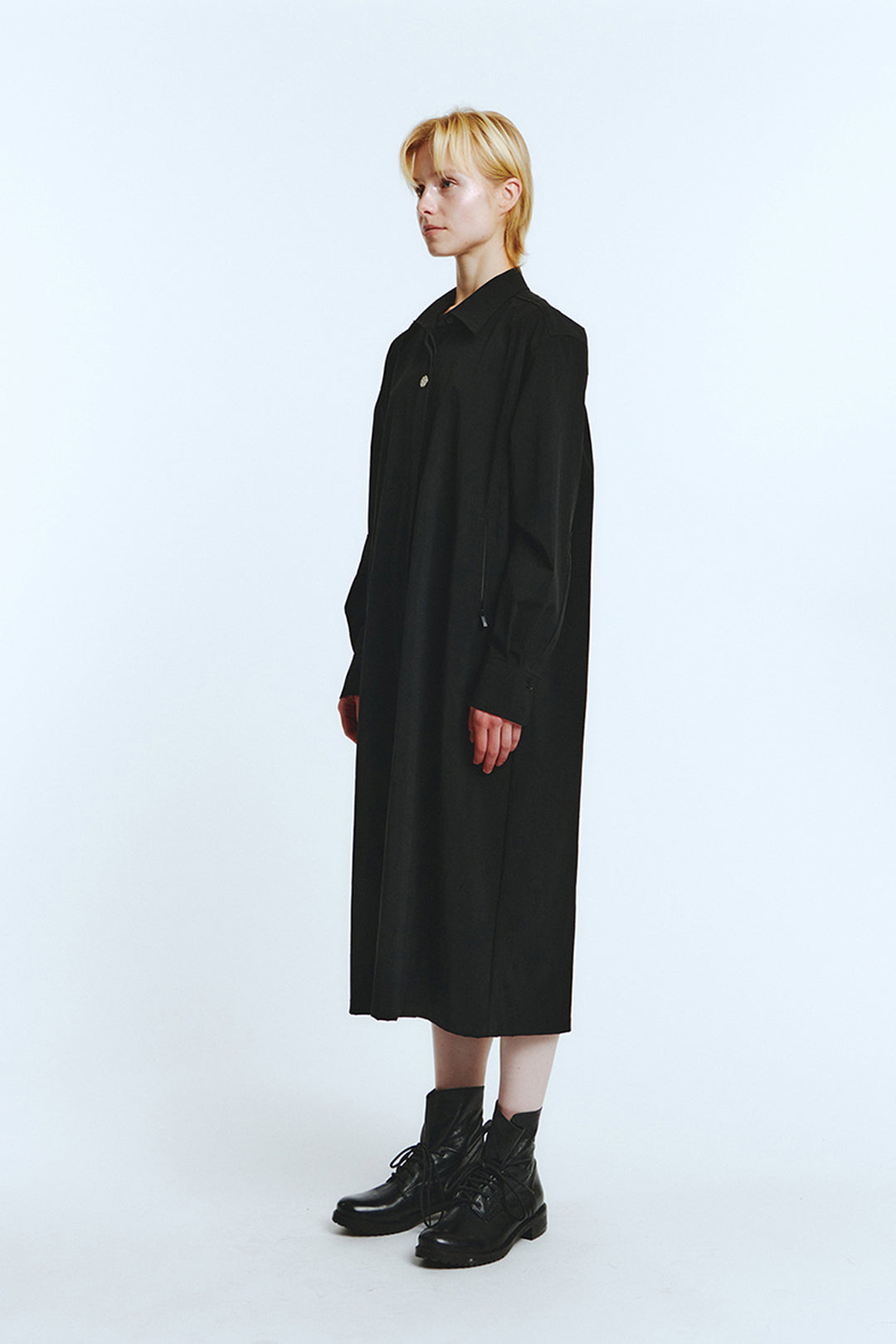 Black long shirt jumper from LOVE CRAZY WILD MAN, featuring a relaxed fit and casual style, shown on a model.