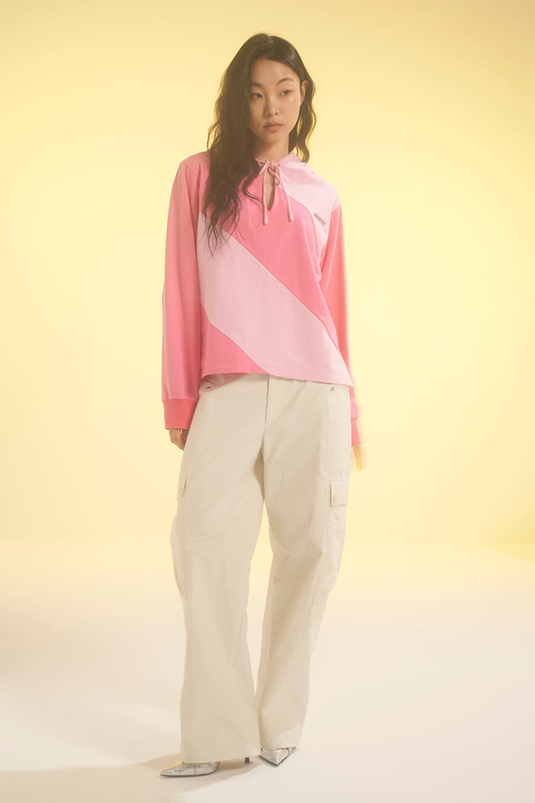 Pink LOVE CRAZY WILD MAN diagonal hoodie with a relaxed fit and bold diagonal design, displayed on a plain background.