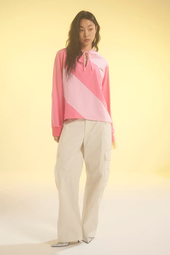 Pink LOVE CRAZY WILD MAN diagonal hoodie with a relaxed fit and bold diagonal design, displayed on a plain background.