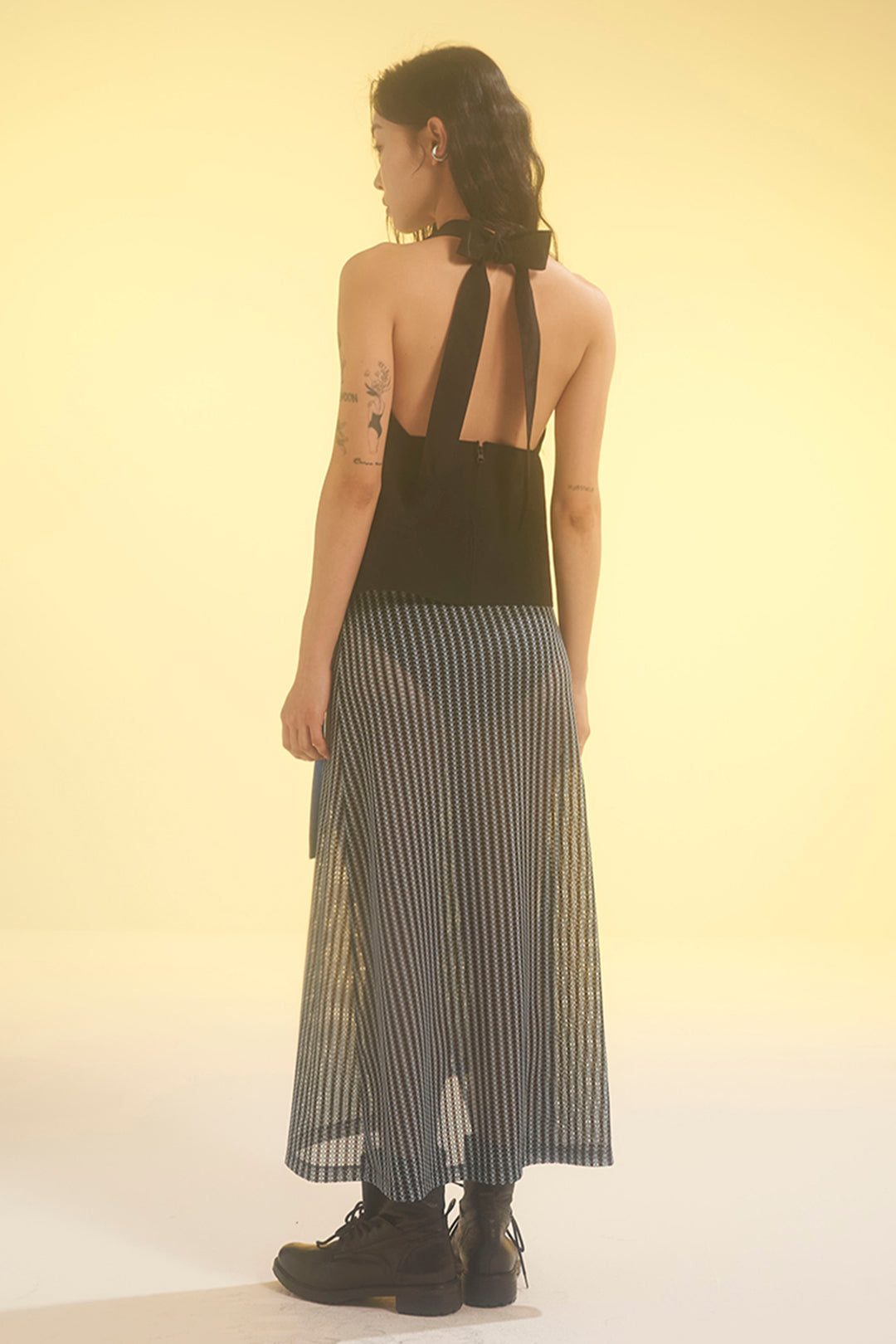 Blue striped mesh wrap skirt by LOVE CRAZY WILD MAN, featuring a flowy, lightweight design with a stylish wrap style.