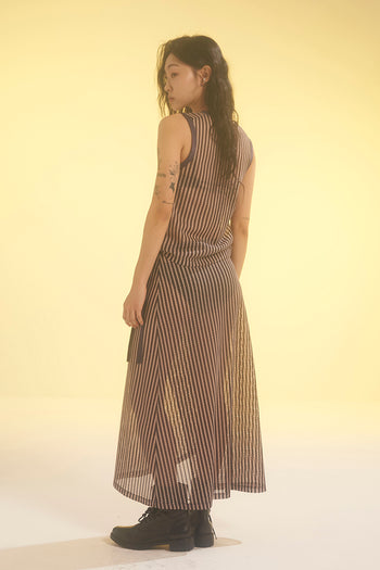 Beige striped mesh wrap skirt by LOVE CRAZY WILD MAN, featuring lightweight, breathable fabric and a stylish wrap design.