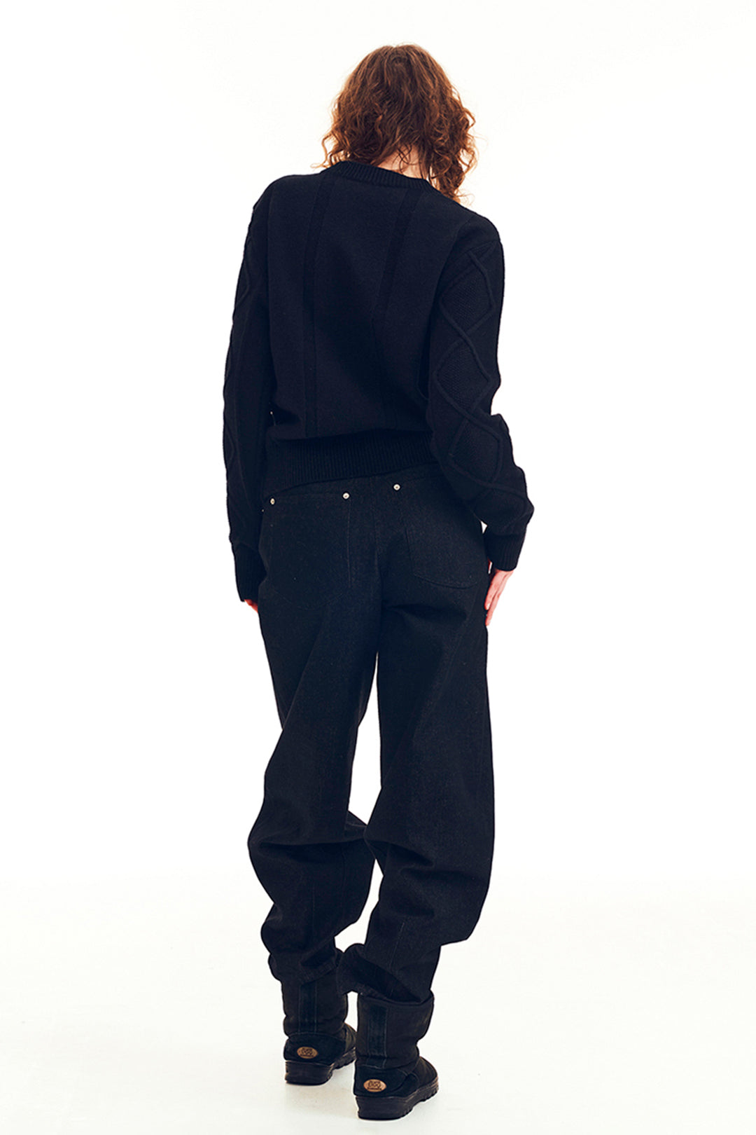 Black LOVE CRAZY WILD MAN sweater featuring a cozy knit design and a relaxed fit, perfect for casual wear.