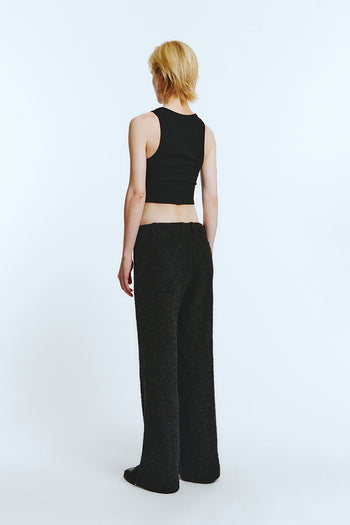 Black Bouncle Bell Bottoms by LOVE CRAZY WILD MAN, featuring wide-leg design and high-waisted fit, shown on a model.