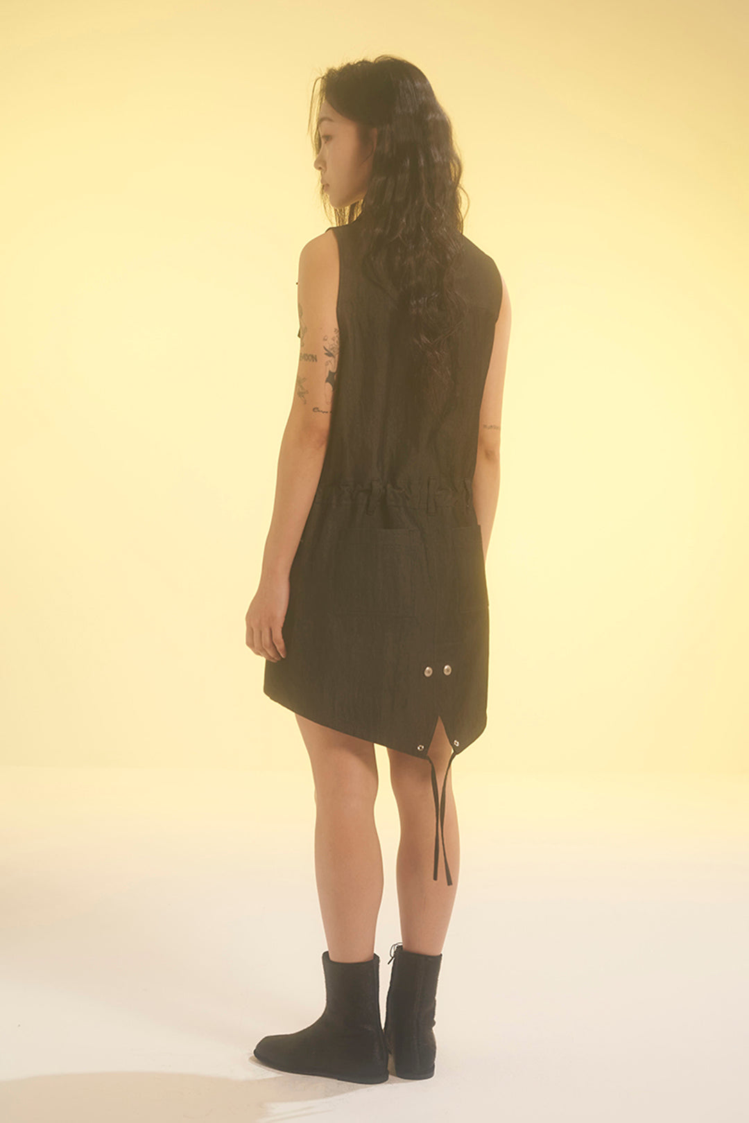 Charcoal Safari Dress by LOVE CRAZY WILD MAN, featuring a stylish, flowy design with a relaxed fit and adjustable straps.