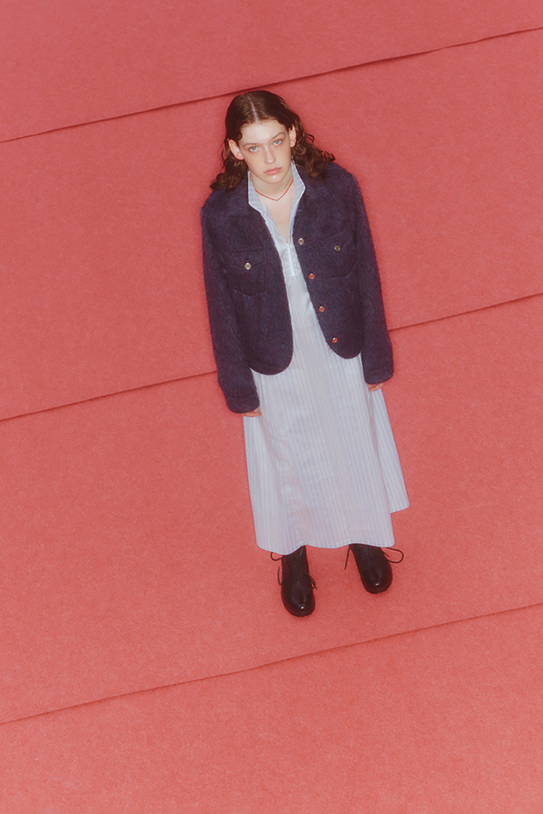 Blue striped high-neck dress by LOVE CRAZY WILD MAN featuring a stylish, fitted silhouette and long sleeves.